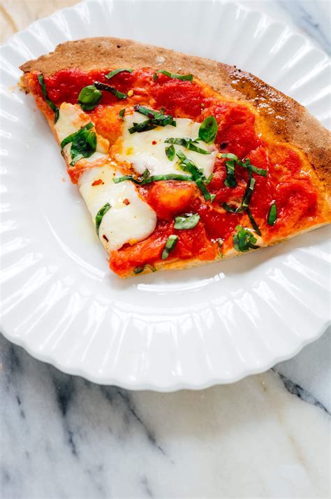 How does Margherita Pizza Slice fit into your Daily Goals - calories, carbs, nutrition