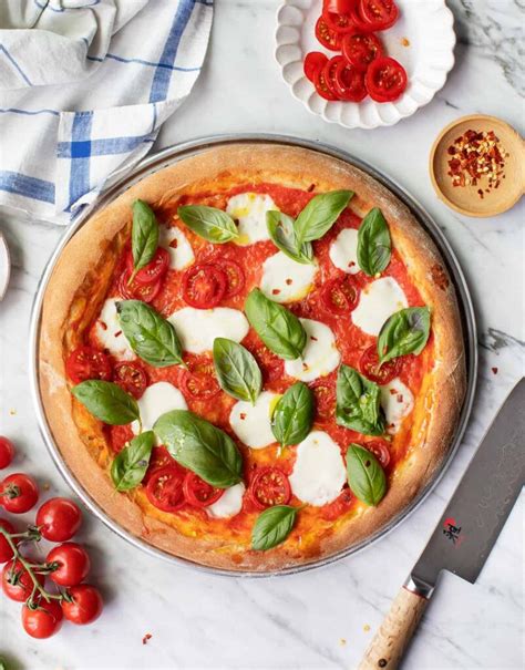 How does Margherita Pizza fit into your Daily Goals - calories, carbs, nutrition