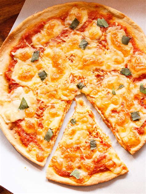 How does Margherita Thin & Crispy Pizza fit into your Daily Goals - calories, carbs, nutrition