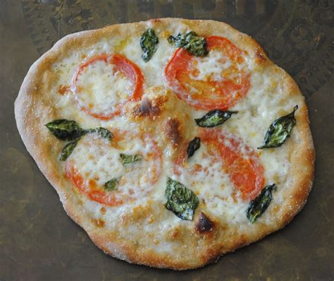 How does Margherita Wheat Pizza fit into your Daily Goals - calories, carbs, nutrition