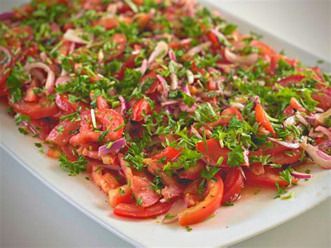 How does Marinated Tomato Salad fit into your Daily Goals - calories, carbs, nutrition