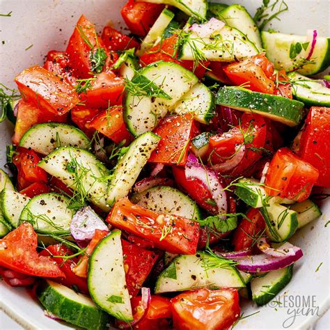 How does Marinated Tomato and Cucumber Salad fit into your Daily Goals - calories, carbs, nutrition