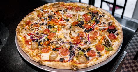 How does Meals - Gourmet Supreme Pizza fit into your Daily Goals - calories, carbs, nutrition