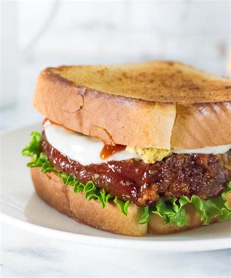 How does Meat Loaf Sandwich with Lettuce & Tomato fit into your Daily Goals - calories, carbs, nutrition