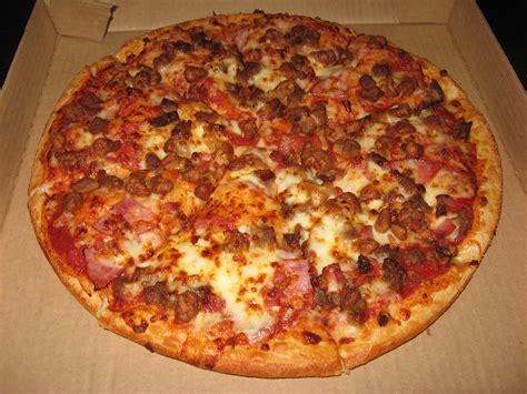 How does Meat Lover's Pizza (8370.7) fit into your Daily Goals - calories, carbs, nutrition