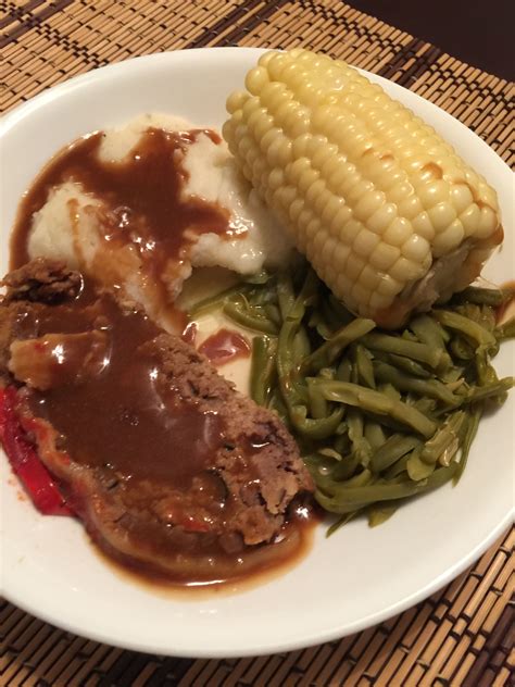 How does Meatloaf withBrown Gravy, Mashed Potatoes Green Beans fit into your Daily Goals - calories, carbs, nutrition