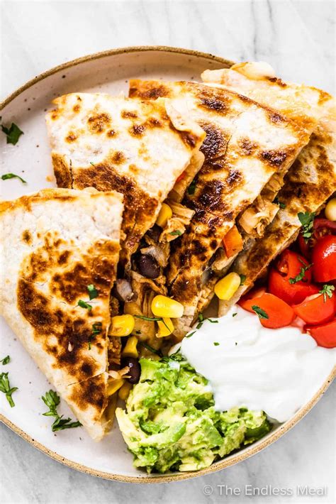 How does Mexican BBQ Chicken Machaca Quesadilla fit into your Daily Goals - calories, carbs, nutrition