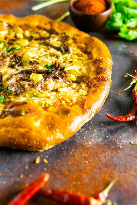 How does Mexican Beef Pizza, Cornmeal Tossed fit into your Daily Goals - calories, carbs, nutrition