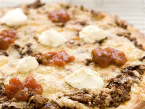 How does Mexican Beef Pizza, Topped fit into your Daily Goals - calories, carbs, nutrition