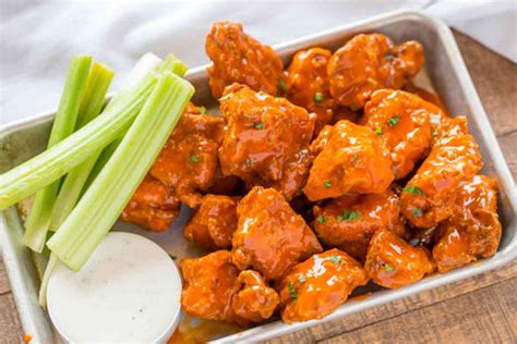 How does Mild Buffalo Wings (Boneless) fit into your Daily Goals - calories, carbs, nutrition