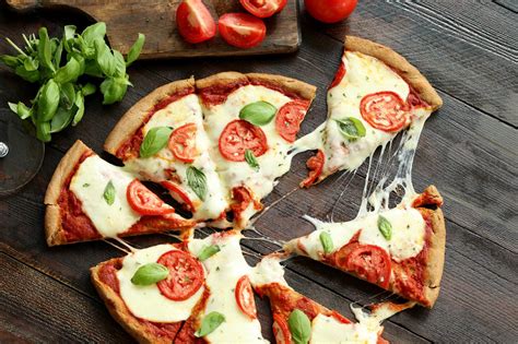 How does Mixed Pepper Pizza Wheat Crust fit into your Daily Goals - calories, carbs, nutrition