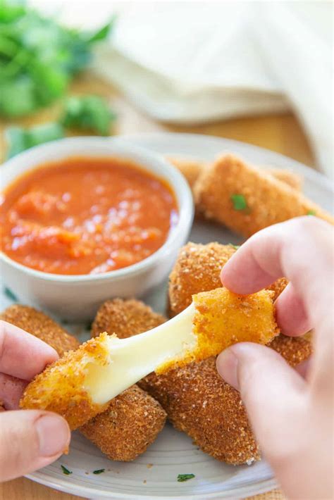 How does Mozzarella Sticks & Marinara Plate fit into your Daily Goals - calories, carbs, nutrition