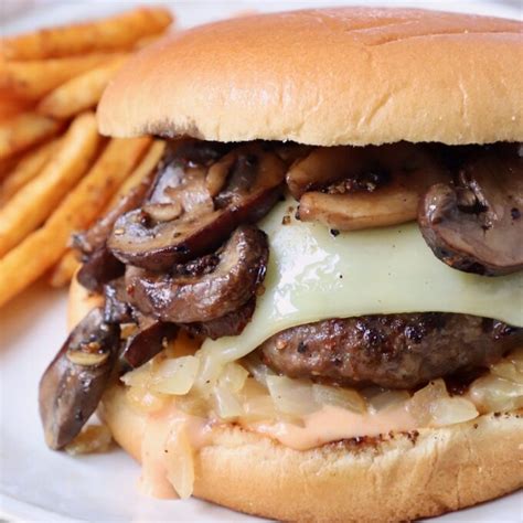 How does Mushroom Onion Swiss Burger fit into your Daily Goals - calories, carbs, nutrition