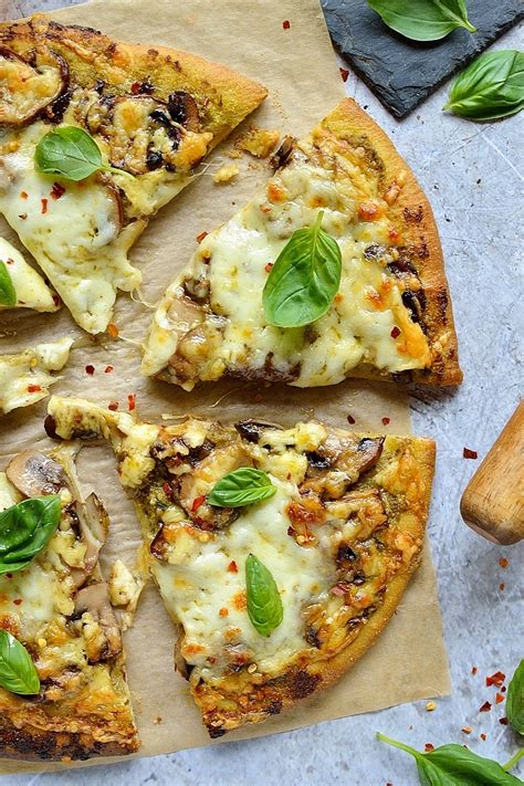 How does Mushroom Pesto Wheat Pizza fit into your Daily Goals - calories, carbs, nutrition