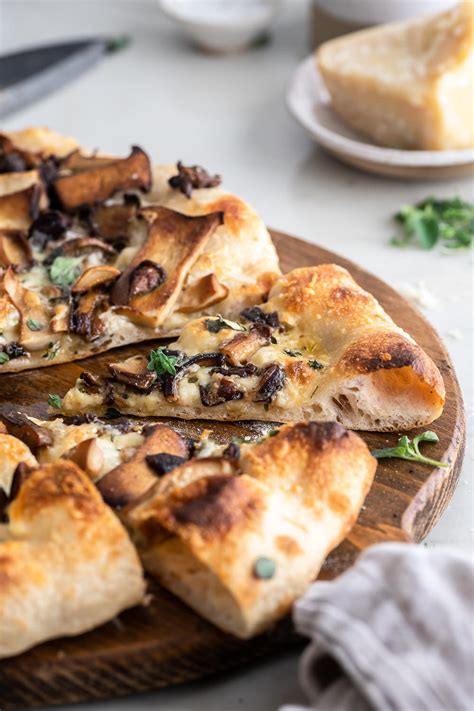 How does Mushroom Pizza Wheat Crust fit into your Daily Goals - calories, carbs, nutrition