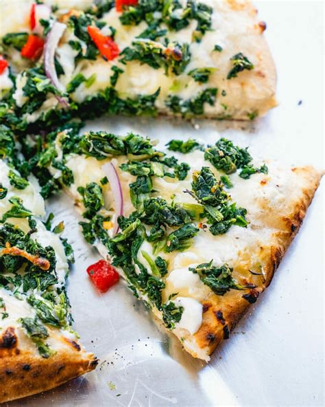 How does Mushroom- Onion and Spinach Pizza fit into your Daily Goals - calories, carbs, nutrition