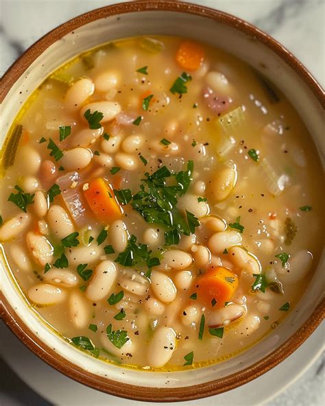 How does Navy Bean Soup, Tomato Broth Soup fit into your Daily Goals - calories, carbs, nutrition