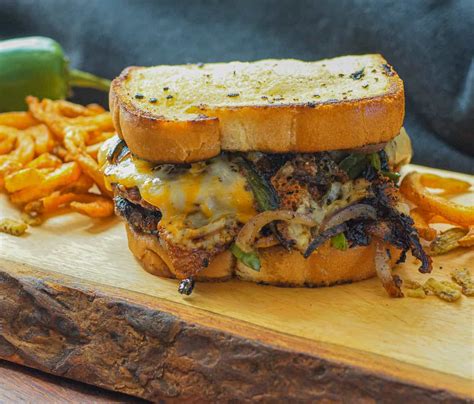 How does OBC Cheeseburger Fresh 5.3 oz Spicy Chile Cheddar on Texas Toast fit into your Daily Goals - calories, carbs, nutrition