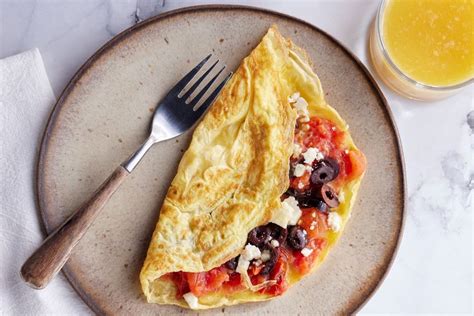 How does Omelet Greek Kalamata Olives Goat Cheese fit into your Daily Goals - calories, carbs, nutrition