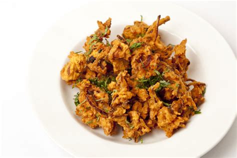 How does Onion Bhaji (68965.0) fit into your Daily Goals - calories, carbs, nutrition