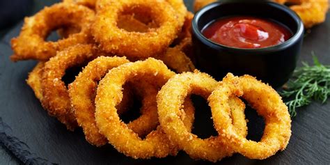 How does Onion Rings - large fit into your Daily Goals - calories, carbs, nutrition