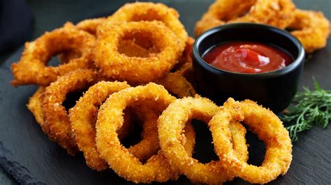 How does Onion Rings Full Order fit into your Daily Goals - calories, carbs, nutrition