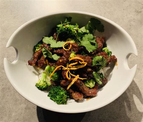 How does Orange Peel Beef with Jasmine Rice fit into your Daily Goals - calories, carbs, nutrition