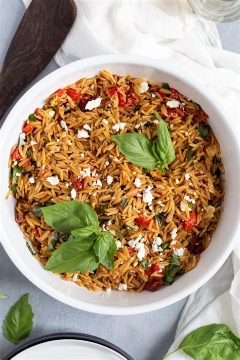 How does Orzo, Sundried Tomatoes & Walnut Salad fit into your Daily Goals - calories, carbs, nutrition