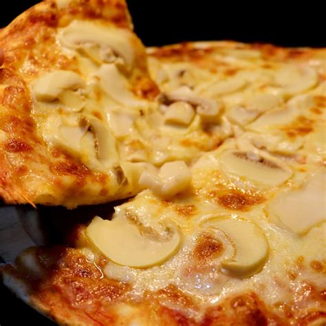 How does PIZZA CHAMPIGNONS fit into your Daily Goals - calories, carbs, nutrition