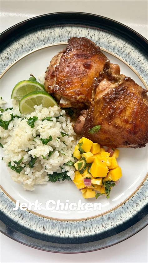How does Pan Roasted Chicken over Braised Collard Greens and Jasmine Rice fit into your Daily Goals - calories, carbs, nutrition