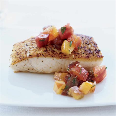 How does Pan-Seared Halibut with Tomato Vinaigrette fit into your Daily Goals - calories, carbs, nutrition