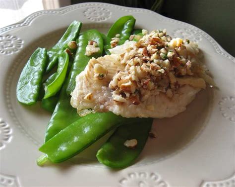 How does Pan-Seared Tilapia with Almond Browned Butter and Pea Pods fit into your Daily Goals - calories, carbs, nutrition