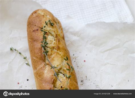 How does Pandinis Baguette Thyme & Parmesan Wedge fit into your Daily Goals - calories, carbs, nutrition