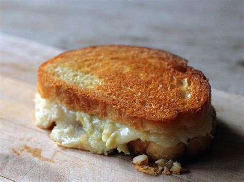 How does Panini Grilled Cheese Quattro Formaggio fit into your Daily Goals - calories, carbs, nutrition