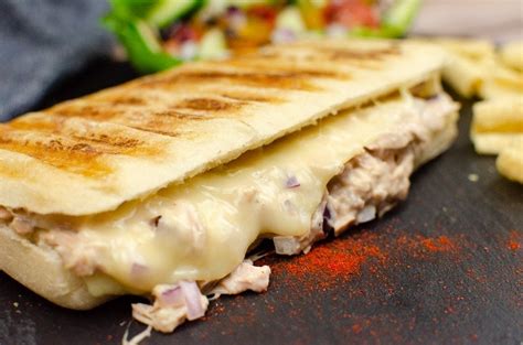 How does Panini Tuna Melt Classic Sunflower Multigrain fit into your Daily Goals - calories, carbs, nutrition