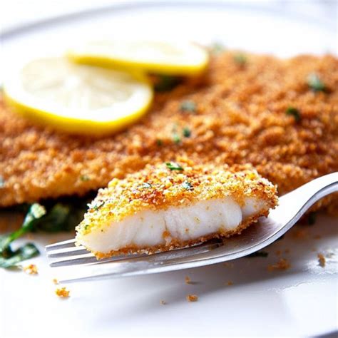 How does Parmesan Crusted Tilapia with chive butter fit into your Daily Goals - calories, carbs, nutrition