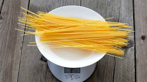 How does Pasta Spaghetti Cooked Basic Method 4 oz fit into your Daily Goals - calories, carbs, nutrition