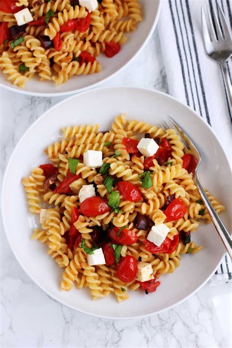 How does Pasta with Olives and Tomatoes fit into your Daily Goals - calories, carbs, nutrition