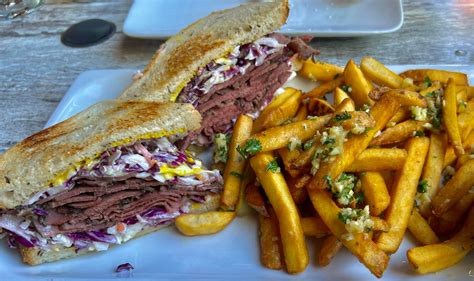 How does Pastrami on Rye with Cole Slaw & Swiss fit into your Daily Goals - calories, carbs, nutrition