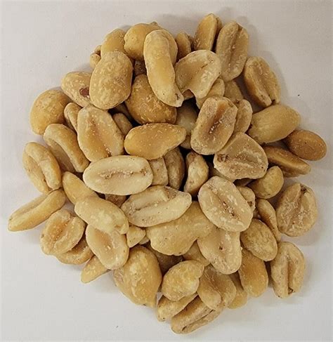 How does Peanuts Dry Roasted Salted 1 Tbsp fit into your Daily Goals - calories, carbs, nutrition