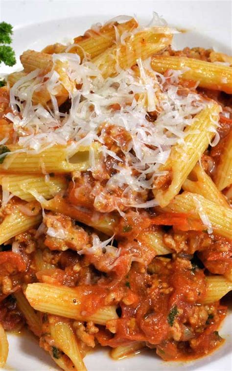 How does Penna Pasta with Meat Sauce with garlic bread and vegetable fit into your Daily Goals - calories, carbs, nutrition