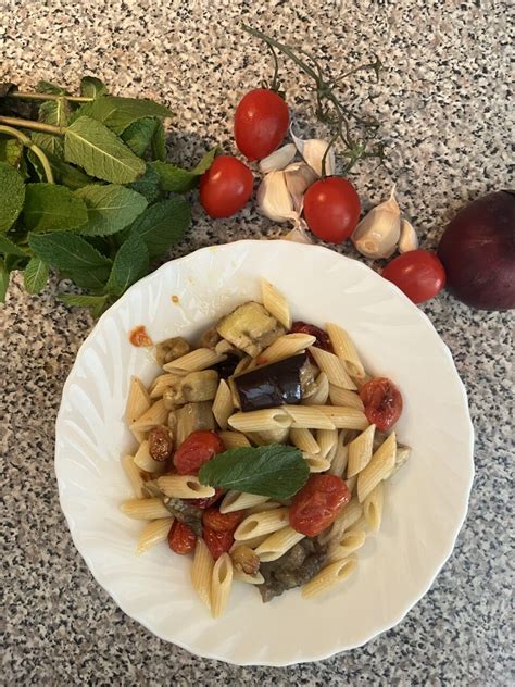 How does Penne Melanzane with Marinara fit into your Daily Goals - calories, carbs, nutrition