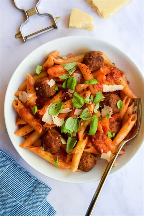 How does Penne with Tomato-Vodka Sauce and Mini Italian Meatballs fit into your Daily Goals - calories, carbs, nutrition