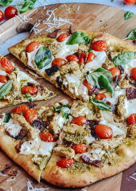 How does Pesto Chicken Pizza - Food On Demand fit into your Daily Goals - calories, carbs, nutrition