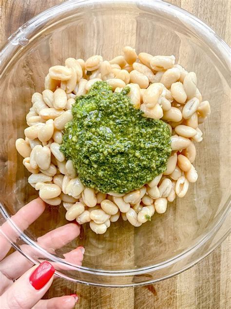 How does Pesto Chicken and White Bean Salad fit into your Daily Goals - calories, carbs, nutrition