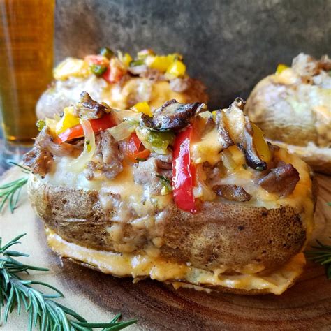 How does Philly Cheesesteak Potato Bowl (1) fit into your Daily Goals - calories, carbs, nutrition