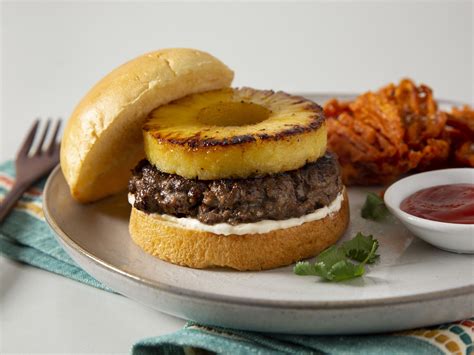 How does Pineapple Teriyaki Angus Burger fit into your Daily Goals - calories, carbs, nutrition