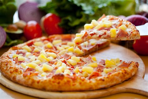 How does Pineapple and Ham BBQ Pizza Wheat Crust fit into your Daily Goals - calories, carbs, nutrition