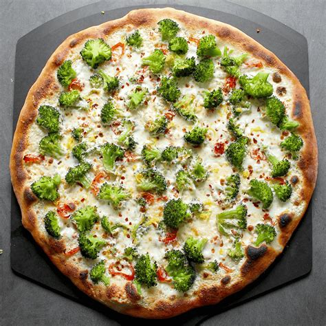 How does Pizza, Broccoli White Sauce (Bostwick) fit into your Daily Goals - calories, carbs, nutrition