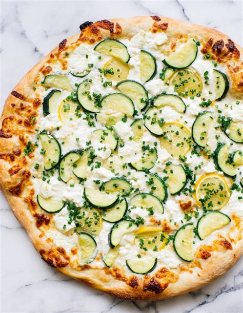 How does Pizza, Zucchini, Olive Oil, Pepper Flake fit into your Daily Goals - calories, carbs, nutrition